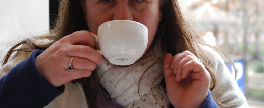 A little sparkle on my white holiday scarf keeps me nice and cozy and just a little dressed up as I enjoy hot cocoa at the Langham Boston's Chocolate Bar.